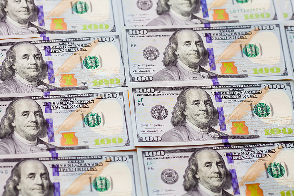 American investments represented by $100 dollar bills