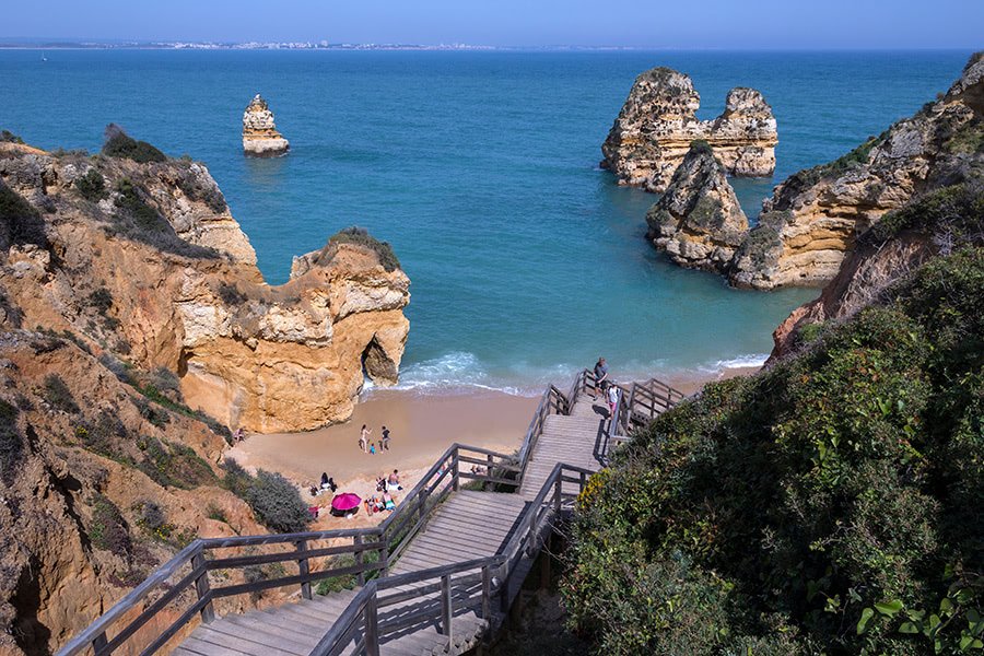 Understanding the Safety in Portugal for Expats 2 Peaceful Algarve beach in Portugal, underlining the safety and tranquility of Portugal