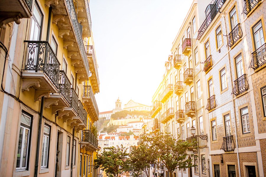 Understanding the Safety in Portugal for Expats 1 Charming street view in Lisbon, Portugal, exemplifying the safety in Portugal.