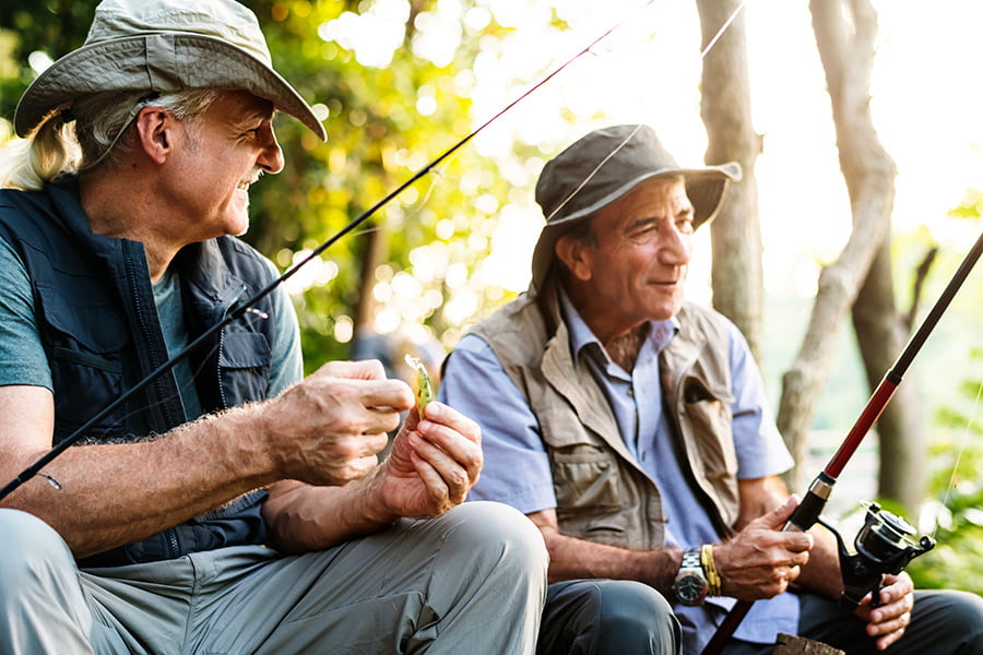 What exciting outdoor activities does Portugal offer? 3 A fisherman patiently waiting for a catch, part of the outdoor activities Portugal offers