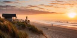 Costa da Caparica in Top Coolest Neighborhoods of 2023 1 Sunset at Costa da Caparica in Top beaches with a beach shack on the left